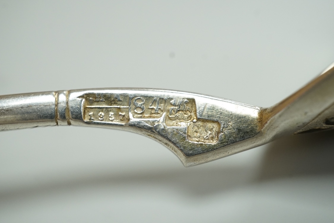 A mid 19th century Russian 84 zolotnik and niello spoon, assay master probably I. Avdyeyev, Moscow, 1857, 18cm.